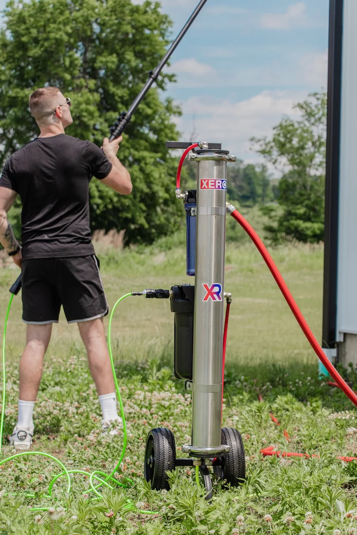 Water-fed pole cleaning system being prepared for a job